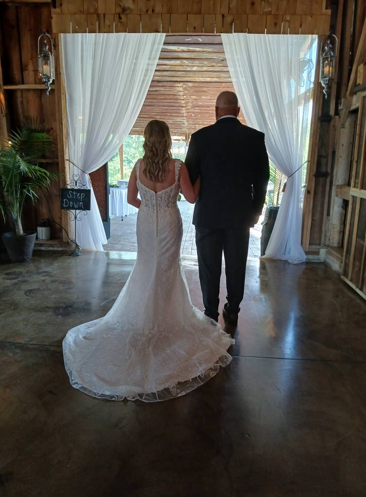 father walking bride down the aisle