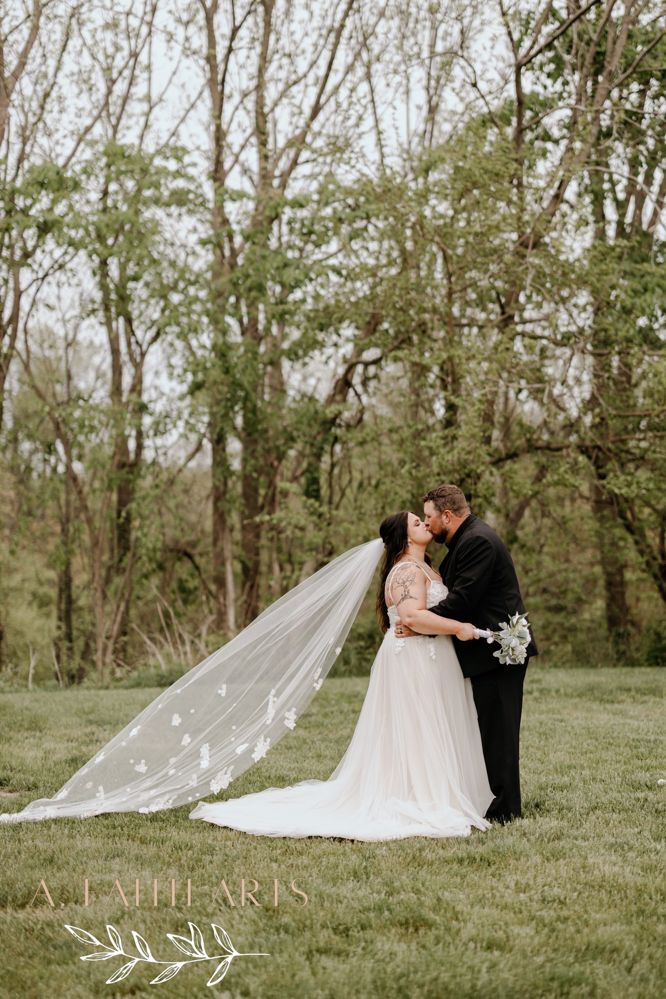 bride and groom kissing