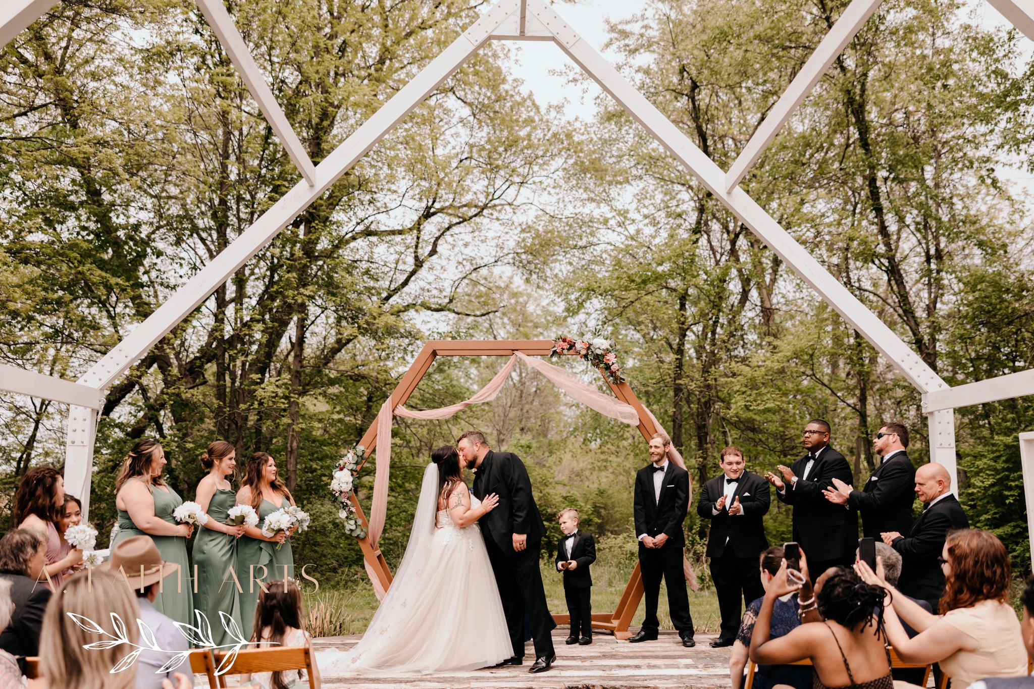 bride and groom's first kiss
