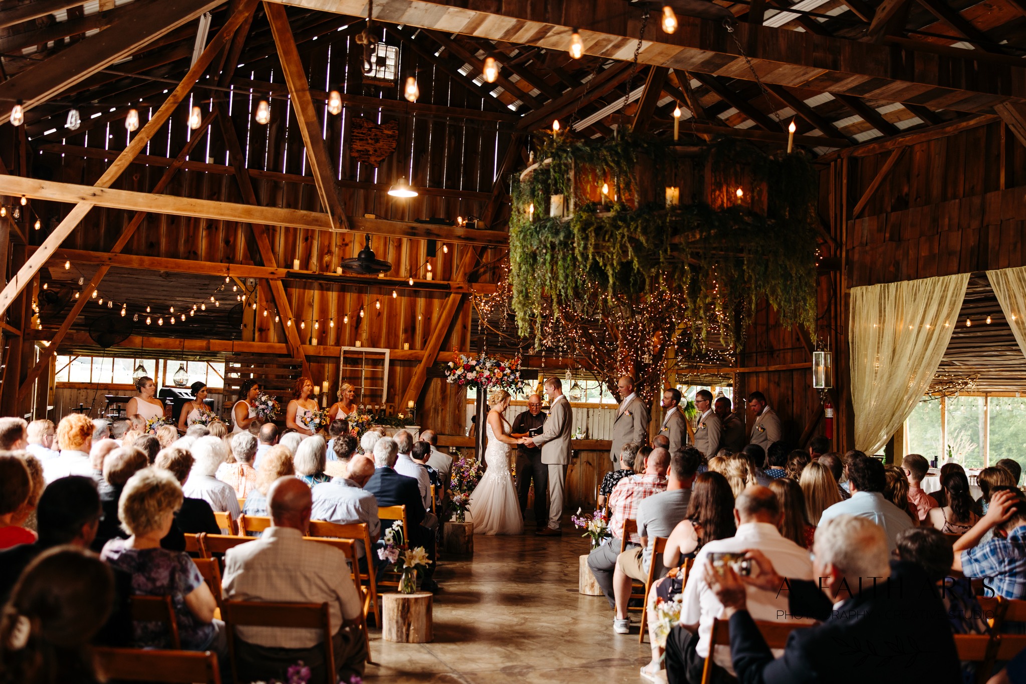 indoor wedding at the palm tree barn