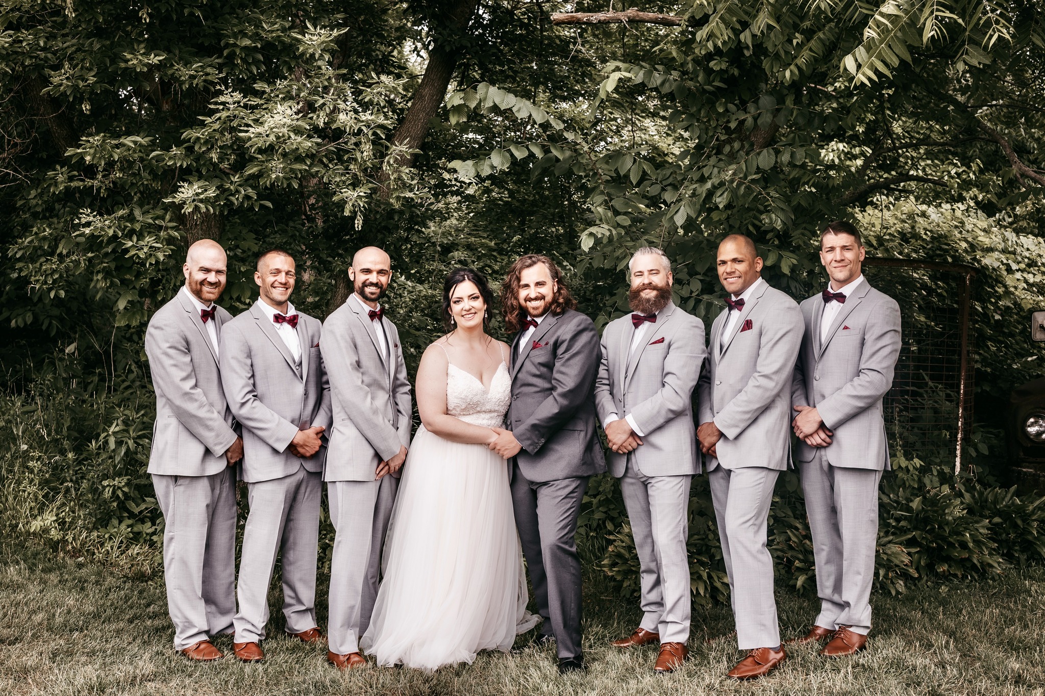 bride and groom with groomsmen