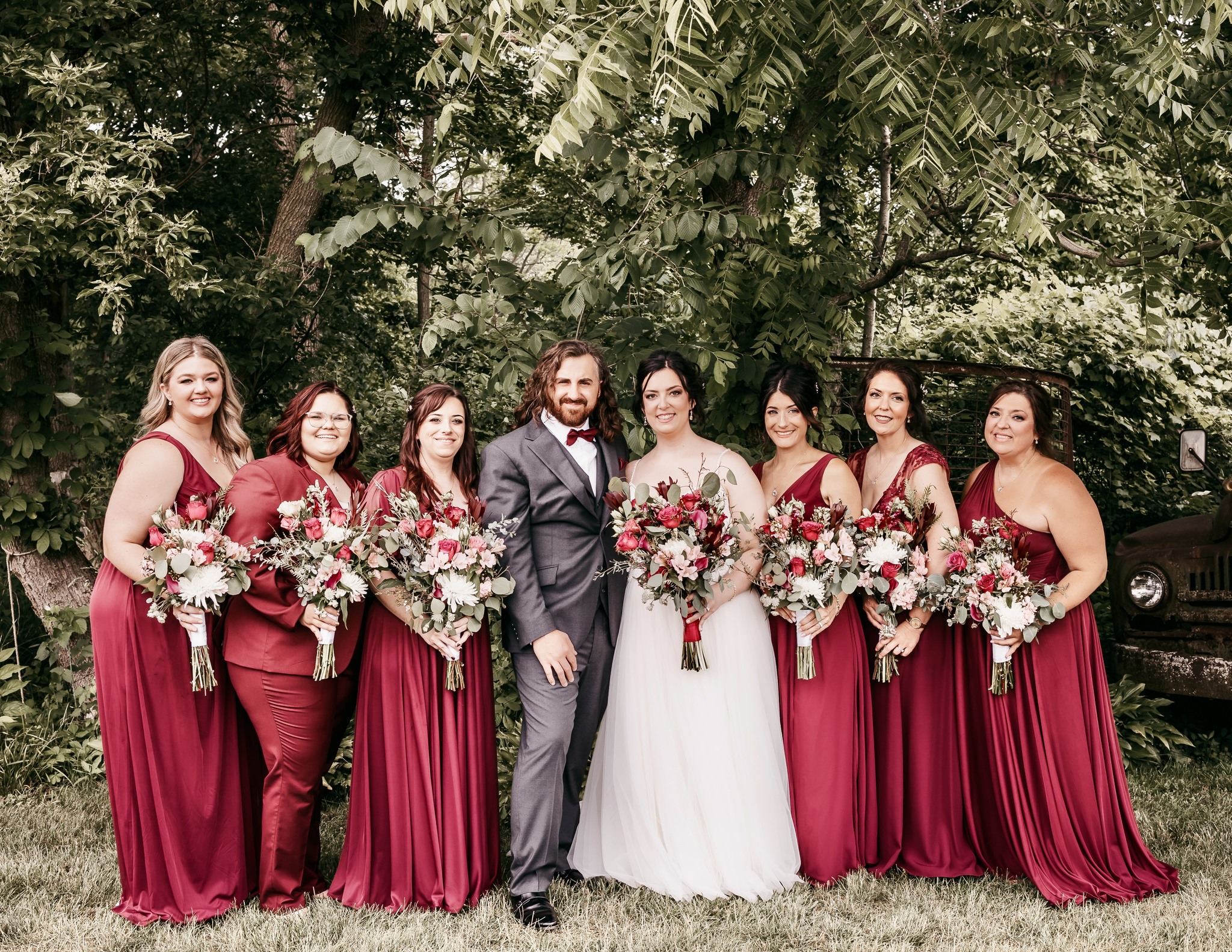 bride and groom with bridesmaids
