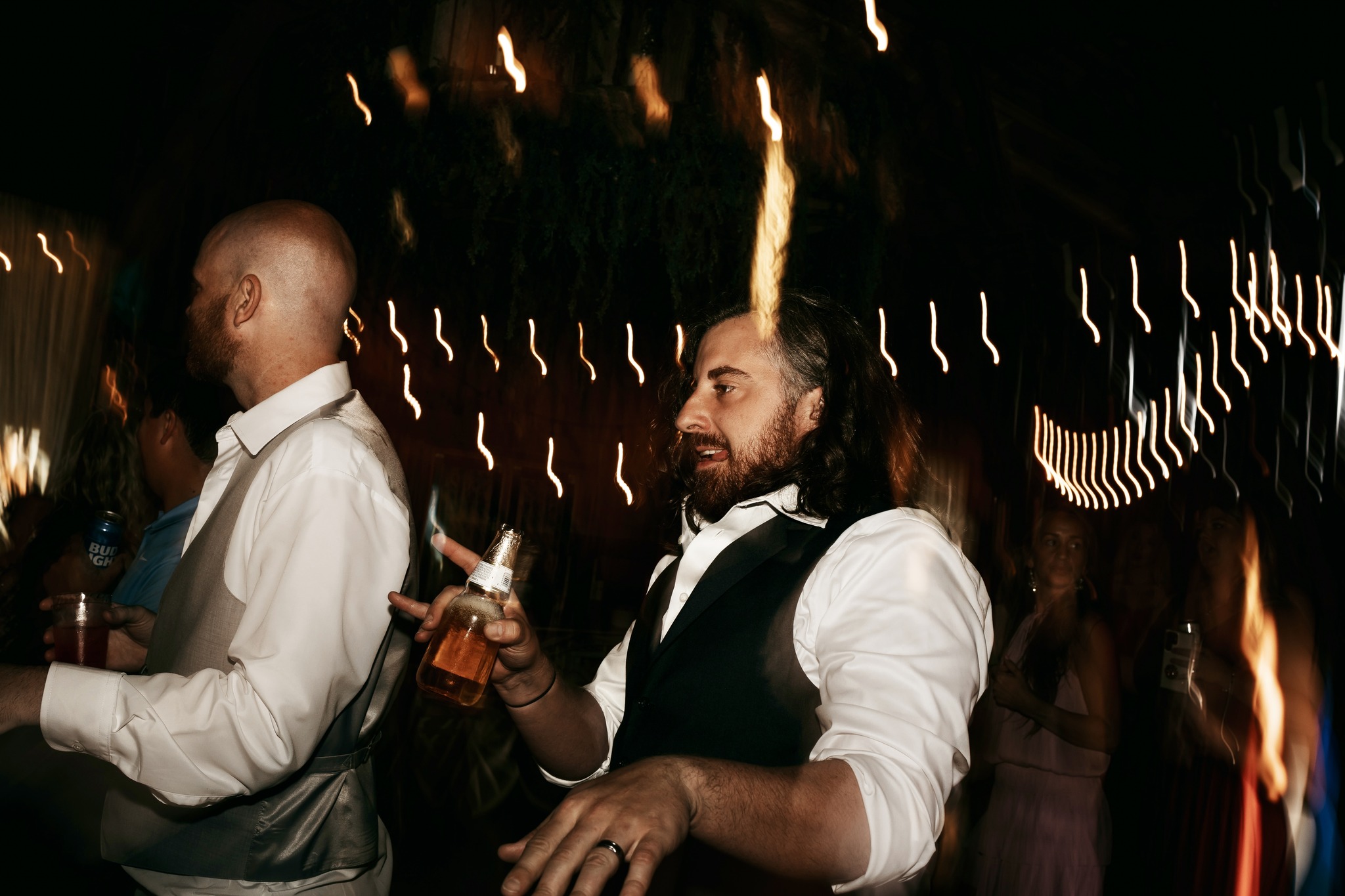 groom and groomsmen dancing