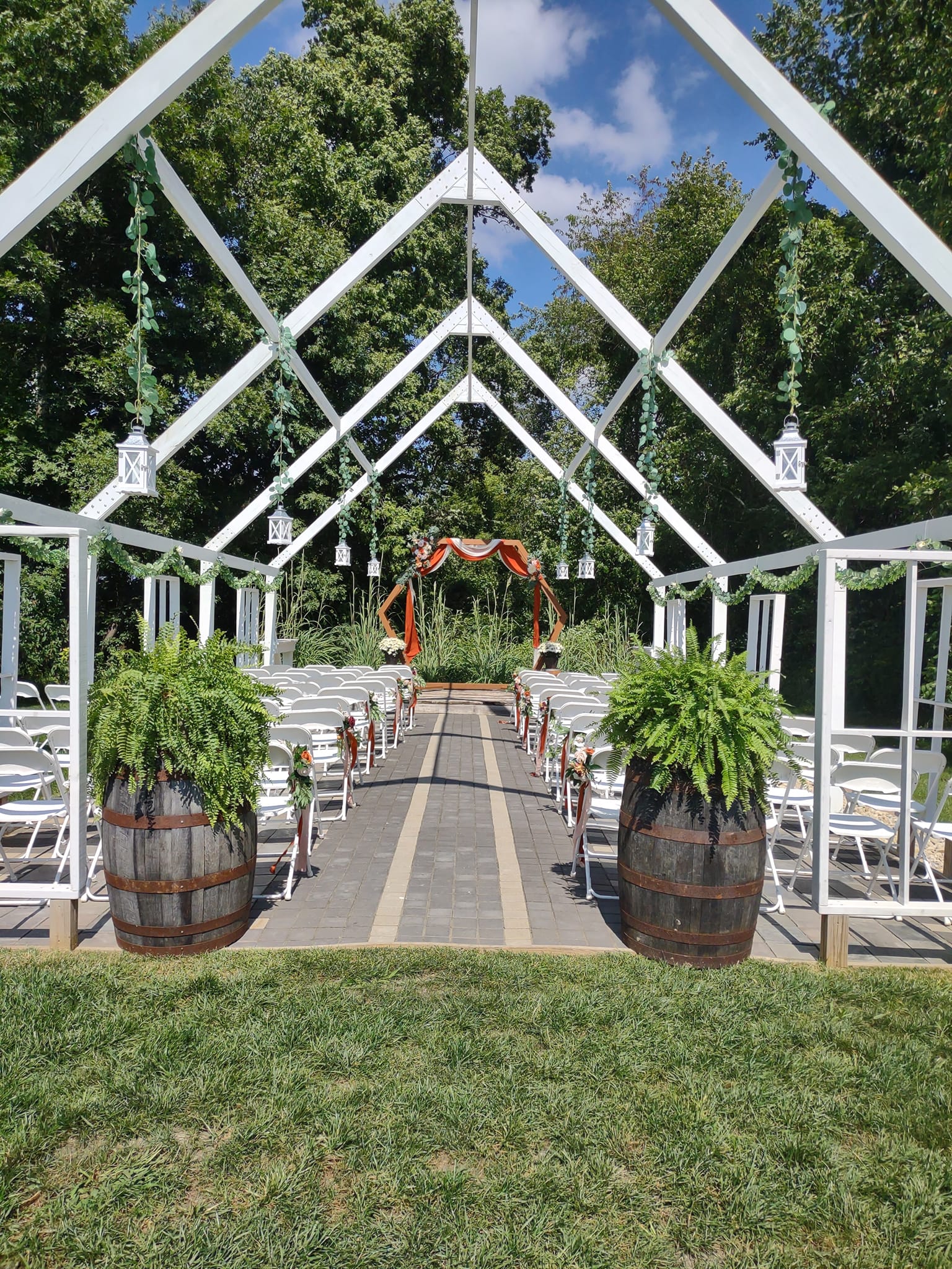 outdoor wedding pergola at the palm tree barn