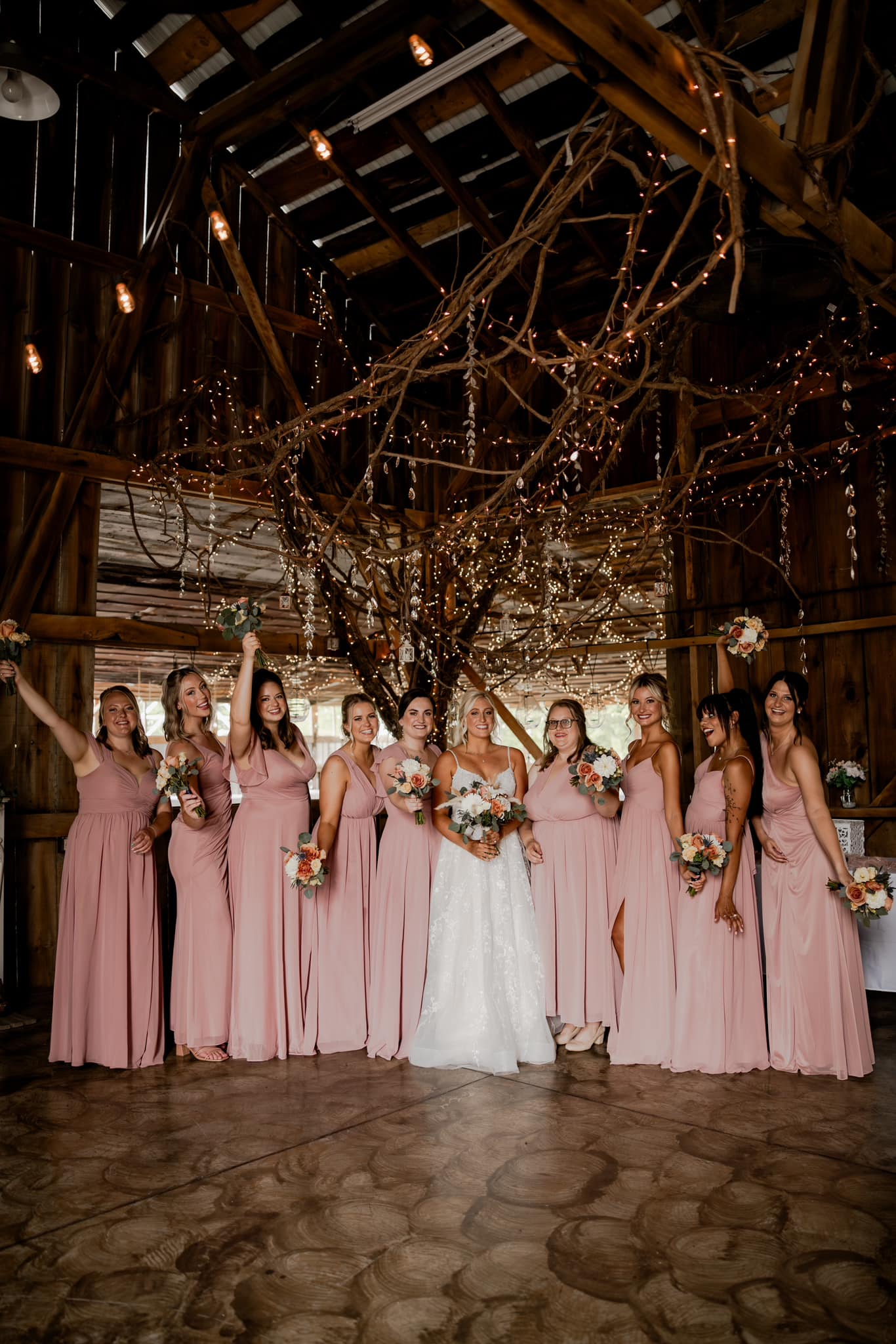 bride and bridesmaids in pink gowns