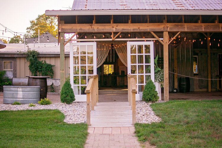 vintage glass doors at the palm tree barn entryway