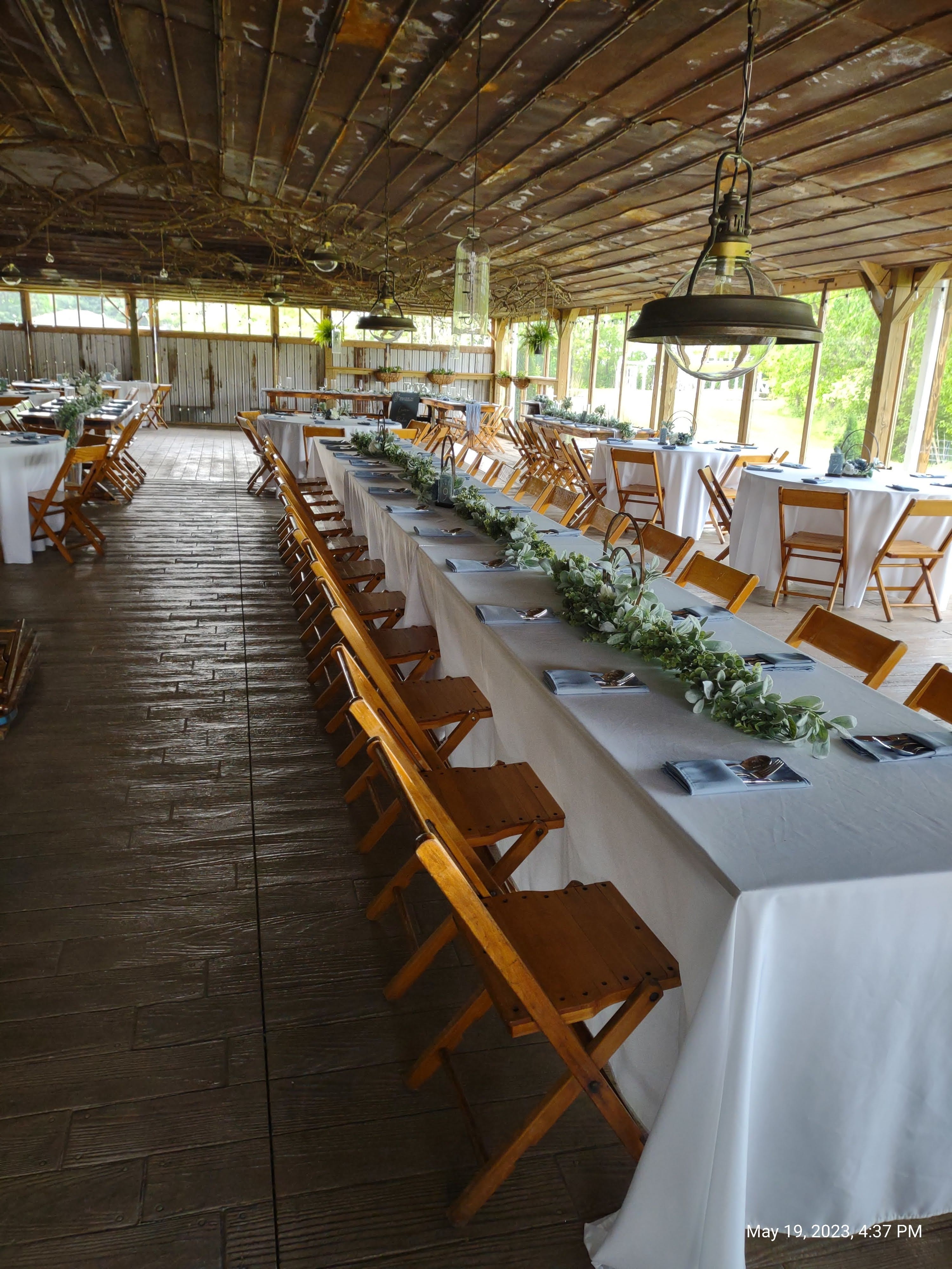 wedding reception under open air barn