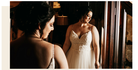 bride looking in mirror